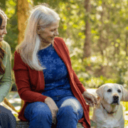 Premier Caregiver with Client and Dog